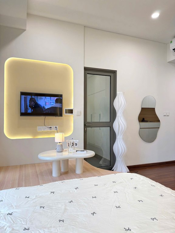 Bedroom & Smart TV — Studio Apartment
